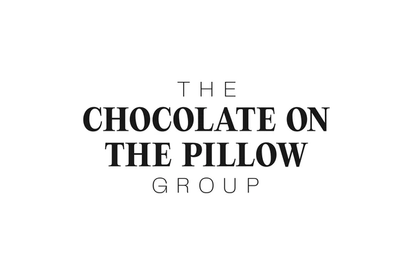 The Chocolate on the Pillow Group Logo